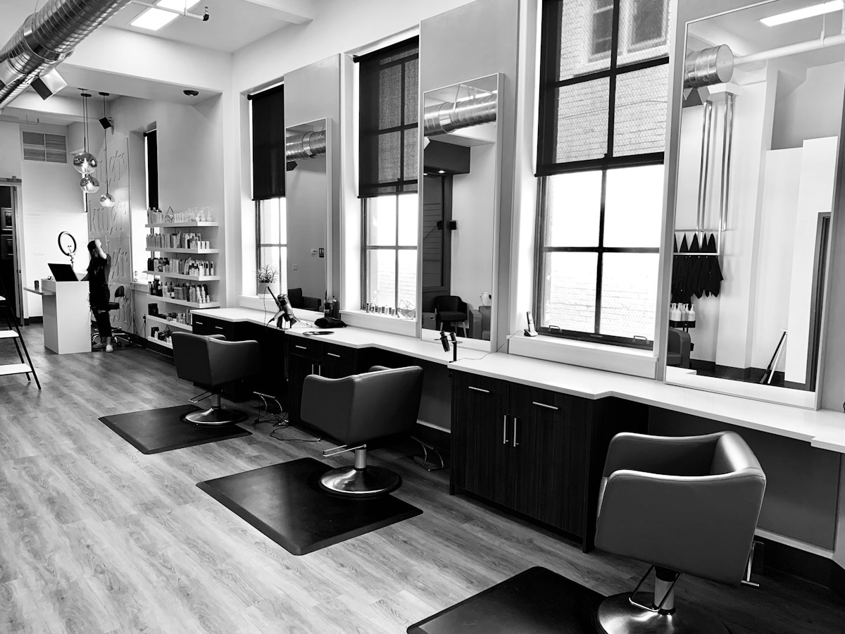 Professional salon interior with styling stations